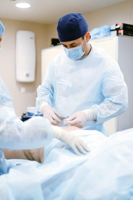 Doctor performing pelvic floor surgery