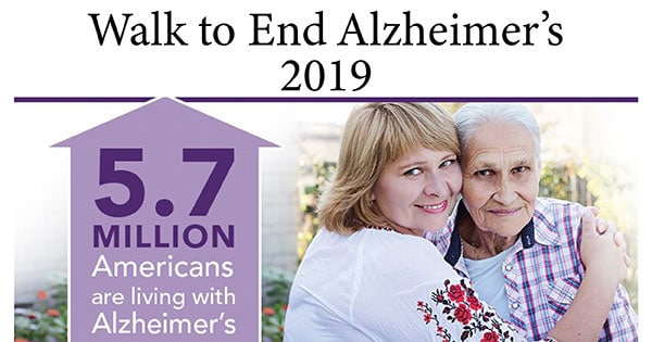woman hugging mother in support of the walk to end Alzheimer's disease 2019